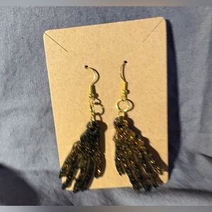 Elegant Black and Glittery Gold Skeleton Hand Earrings